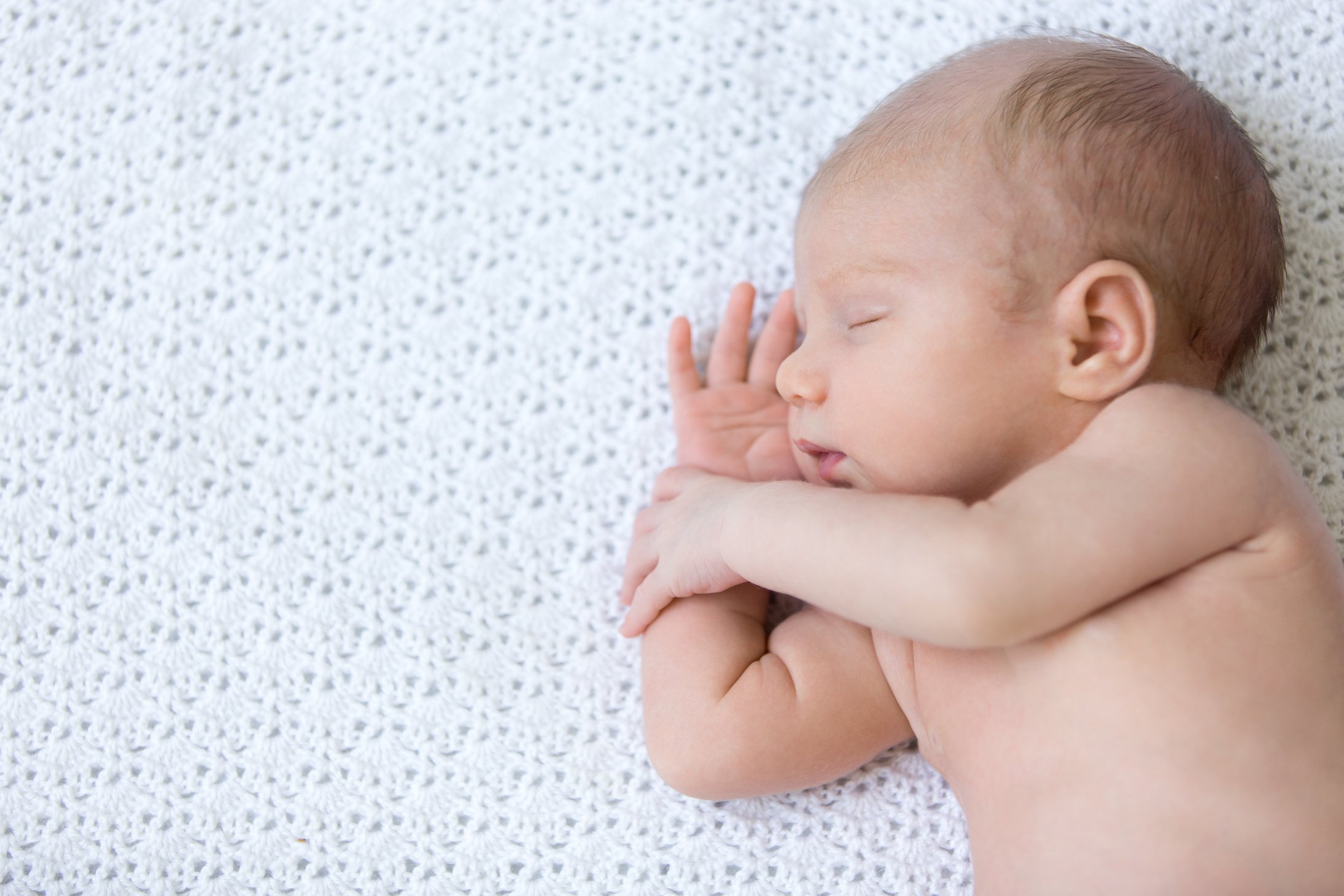 Sleeping newborn baby. Top view